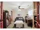 A cozy office space showcases a gray couch and a desk with ample lighting, perfect for working from home at 6655 Teeters Ln, Martinsville, IN 46151