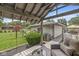 Backyard patio with seating and views of the home's exterior at 7125 Chandler Dr, Indianapolis, IN 46217
