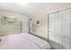 Bright bedroom with a bed, closet, and trim details at 7125 Chandler Dr, Indianapolis, IN 46217