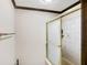 This bathroom offers a shower and bathtub combination with unique tile surround at 7165 W State Road 252 W Rd, Edinburgh, IN 46124