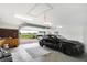 Spacious garage with ample lighting and a sleek black car parked inside at 7165 W State Road 252 W Rd, Edinburgh, IN 46124