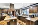 Traditional kitchen features wood cabinets, neutral countertops, and stainless-steel appliances at 7165 W State Road 252 W Rd, Edinburgh, IN 46124