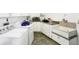 Functional laundry room with washer, dryer, sink, and ample cabinet space at 7165 W State Road 252 W Rd, Edinburgh, IN 46124