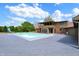 Back exterior view of the home with swimming pool, and wooden deck on a sunny day at 7165 W State Road 252 W Rd, Edinburgh, IN 46124