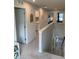 Spacious hallway with multiple doorways and views into other rooms of the home at 7270 W Stone Pass, New Palestine, IN 46163