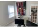 Modern office space with natural light, soccer memorabilia, and functional dual monitor desk setup at 7270 W Stone Pass, New Palestine, IN 46163