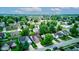 A scenic aerial view of a residential area featuring well-maintained homes and lush green trees in a Gathering-friendly neighborhood at 741 Chestnut Ln, Brownsburg, IN 46112