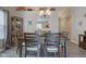 Dining room with wood floors, natural light, and stylish decor at 741 Chestnut Ln, Brownsburg, IN 46112