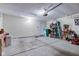 Clean garage features a finished floor, and space for storage at 741 Chestnut Ln, Brownsburg, IN 46112