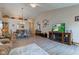 Bright open-concept living room featuring vaulted ceilings, wood floors, and modern decor at 741 Chestnut Ln, Brownsburg, IN 46112
