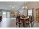 Open-concept living and dining area with vaulted ceilings and natural light at 741 Chestnut Ln, Brownsburg, IN 46112