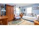 Comfortable bedroom with a daybed, wood furniture, and lots of light creating a cozy and inviting space at 7651 Sherry Ln, Brownsburg, IN 46112