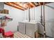 Basement laundry area featuring a washer and dryer with tiled floors at 7651 Sherry Ln, Brownsburg, IN 46112