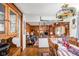 Inviting living room with a fireplace, wood-paneled walls, and comfortable seating, perfect for relaxation at 7651 Sherry Ln, Brownsburg, IN 46112