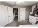 Bedroom features several closets and an open doorway at 7710 Samuel Dr, Indianapolis, IN 46259