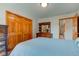 Bedroom with double closet and dresser at 7911 Bentley Commons Dr, Indianapolis, IN 46259