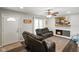 Bright living room featuring a fireplace, white shiplap wall, and a sliding glass door at 8025 Meadow Ln, Indianapolis, IN 46227