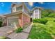 Inviting two-story home featuring a brick facade, attached garage, and well-maintained landscaping at 8178 Foxchase Cir, Indianapolis, IN 46256