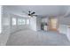 Spacious living area features natural light, a wet bar, and direct access to the bathroom at 8178 Foxchase Cir, Indianapolis, IN 46256