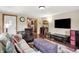 Spacious living room featuring hardwood floors, comfortable seating, and an open layout with ample space at 8760 Big Bend Rd, Martinsville, IN 46151