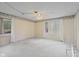 Spacious bedroom featuring two windows and neutral colors with neutral carpeting at 904 Dreamy St, Greenwood, IN 46142
