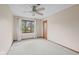 Cozy bedroom with a ceiling fan and large windows providing ample natural light at 904 Dreamy St, Greenwood, IN 46142
