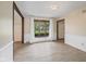 Empty living room featuring light colored walls and floors with a bright window at 904 Dreamy St, Greenwood, IN 46142