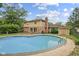View of the pool and backyard showcasing the home's well-maintained exterior and outdoor space at 904 Dreamy St, Greenwood, IN 46142