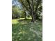 Expansive backyard with a picnic table and fire pit at 9168 S State Road 9, Flat Rock, IN 47234