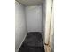 Basement with painted walls and flooring, showing door leading to another room at 9168 S State Road 9, Flat Rock, IN 47234