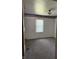 Carpeted bedroom with natural light from a window, offers a cozy retreat at 9168 S State Road 9, Flat Rock, IN 47234