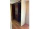 Functional closet space with built-in wooden storage cabinets at 9168 S State Road 9, Flat Rock, IN 47234