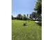Cleared land on the property with scattered bushes and trees at 9168 S State Road 9, Flat Rock, IN 47234