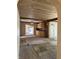 Inviting living area with wooden ceilings and beams, creating a warm ambiance at 9168 S State Road 9, Flat Rock, IN 47234