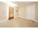 A simple bedroom with carpet and neutral colors is a blank canvas at 917 W 8Th St, Anderson, IN 46016