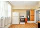A functional kitchen space includes essential appliances and ample cabinet storage at 917 W 8Th St, Anderson, IN 46016