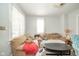 Inviting living room with comfortable seating, pillows, and neutral decor at 917 W 8Th St, Anderson, IN 46016