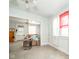 Bright and airy living room with open doorway to another room, filled with natural light and comfortable furnishings at 917 W 8Th St, Anderson, IN 46016