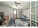 A versatile room is shown with exercise equipment and natural light at 917 W 8Th St, Anderson, IN 46016