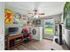 Well-lit bedroom with wood floors, neutral walls, and a ceiling fan at 9265 Brunson Run, Indianapolis, IN 46256