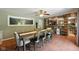 Bright dining room featuring a fish tank, open to the kitchen with tile floors at 9265 Brunson Run, Indianapolis, IN 46256