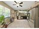 Well-lit kitchen with stainless steel appliances, granite counters, and a stone archway at 9265 Brunson Run, Indianapolis, IN 46256
