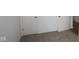 Carpeted room featuring neutral walls and multiple doors for easy access to other rooms at 10604 Maidenhair Dr, Indianapolis, IN 46239