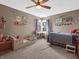 Bright bedroom featuring a corner window, and two beds in a cozy space at 1067 Barley Cir, Carmel, IN 46032