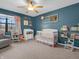 Charming Bedroom featuring a crib, changing table, and delightful decor creating a warm and inviting space at 1067 Barley Cir, Carmel, IN 46032