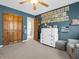 Inviting bedroom featuring ample closet space, neutral carpet, and soothing wall color at 1067 Barley Cir, Carmel, IN 46032
