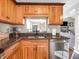 Spacious kitchen with granite countertops, stainless steel appliances, and light wood cabinets at 1067 Barley Cir, Carmel, IN 46032