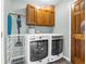Laundry room with washer, dryer, and cabinetry at 1067 Barley Cir, Carmel, IN 46032
