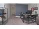Comfortable office space featuring a gray accent wall and a spacious desk for optimal productivity at 11663 Winnower, Noblesville, IN 46060