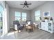Cozy living room features neutral walls, two armchairs and natural light, creating an inviting and comfortable space at 11663 Winnower, Noblesville, IN 46060